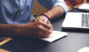 Adult creating an action plan during therapy in Tulsa Oklahoma